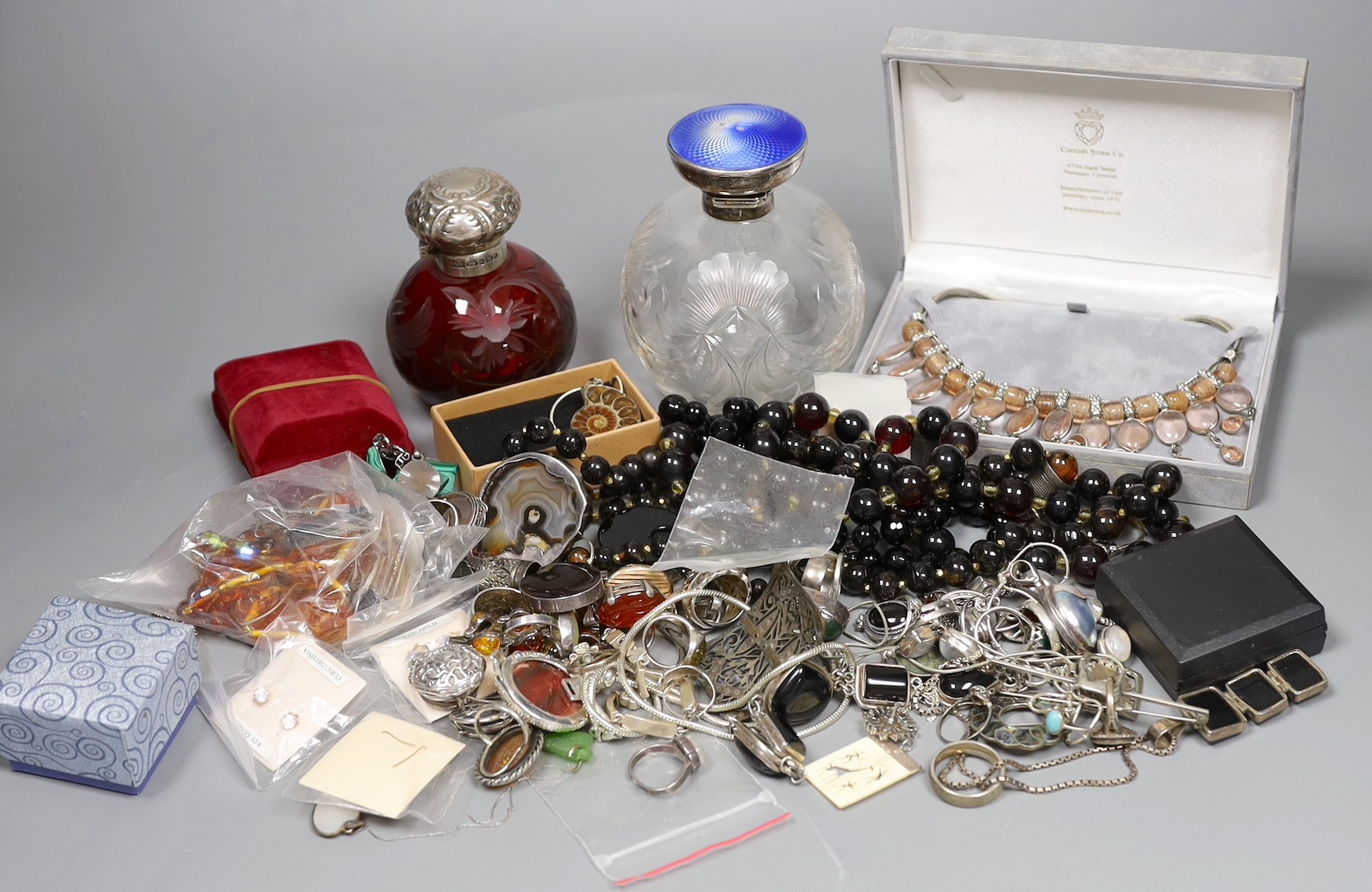 Two silver mounted glass scent bottles including late Victorian ruby glass and a quantity of assorted mainly costume jewellery.